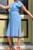 I love this dress! The material is very light and cozy. I love dresses like this that you can just throw on and not really have to think about. I'm usually between a small and medium and got a small and it fits perfectly. I will definitely get a lot of wear out of this. - Laura M.