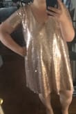 Love the color and this dress feels amazing to wear. The size and density of sequins is very nice and luxe. The fit is very loose and boxy. I ordered my usual size but then couldn't size down because they were sold out. I don't know if it's the most flattering for my curves but I love the way it feels on enough to not care. - Emily H.
