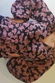 I thought I was getting a dress a little upsetting when I saw it was just the top. The top is fun and flowy a little small if you have a bigger chest. Paired it with black jeans. - Daniela Z.