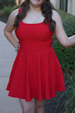Great bright red color i was looking for. the material flairs out at the bottom for the prefect fit. does cinch the waist really nice but can bunch you there. overall super happy with this dress. i'm was hesitant if a Large would fit, as i'm a 36DDD or 38 DD but the large fits just right. can look a little short if not pulled down, but other than that it's awesome. - Megan S.