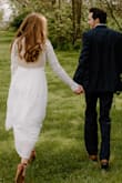 Our big wedding day in April was postponed to 2021, but we decided to have a "microwedding" or "mini-mony" with just our immediate family. I wore this dress and it was perfect! It photographed so well and I got so many compliments. People thought that this was my original wedding dress because it looks very elegant. It does run a little long. I wore 3" heels and it was still a little long for me. - Mariellen V.