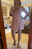 This material on this dress is going to be perfect for the summer. So light and comfortable. The sleeves add a nice touch. Keep in mind it is somewhat see through and could be a little short. - Rocio G.