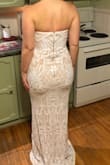 I bought a few dresses, the other ones were great, but thick material. This one was very nice, soft, shimmery and medium thickness. I will need to wear spanx to smooth out my stomach. The clasp is hard to close, its a longer shape than normal, I had to get help to do up the dress. But when fastened it was very comfy, I would rather tight then falling down. I am not wearing shoes in the picture, so i have about two inches to work with, when it comes to heal size. I feel like a mermaid in this dress, it's absolutely beautiful and would recommend to anyone. - Siobhan G.