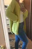 A wonderful, happy yellow sweater. So soft and cozy. I wear it laying in bed and out and about. It is fragile in ways though where it could get caught on something and rip so be gentle. I love it. - Katy B.