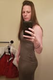 The dress is made of a very comfortable and stretchy material. The cut is flattering. There is a pocket that runs across the stomach and tends to bunch up, but it's easy enough to straighten out. The dress falls a bit shorter on me than it does on the model, but still looks nice. - Alynn M.
