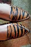 Does not fit well. A little too narrow around the toes and leather is stiff, which causes it to pinch across the toes. Also, the sides open up as if the shoe is too wide. A dichotomy... Just not made well. - Allison L.