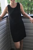 Already love the dress. From the photos I expected it to be casual maybe cotton (should have read the materials) but it's actually a very quality fabric and lined! The dress it's a tad loose but I think that's the look it's supposed to be so I am keeping the medium but if you want a more tight fit on the hips then I'd say size down. The back zips and you can't see down the back so that's a win! I think this will be great for summer party's! - Jacqueline G.