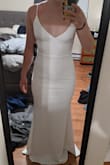 The material is thick and high quality, but also stretchy and super comfortable! With the stretchiness, I sized down, so it really hugs my curves. I was looking for a minimalist, chic dress, and that is exactly what this is!! - Rachel S.