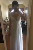 This is a beautiful dress, it fits me perfectly. I ended up picking a different Lulu's wedding dress that is slightly more my style, but it was a hard choice. I wouldn't have been disappointed with this one. I think this one is slightly less "bridal," but it would make a great choice for a bridesmaid, IMO. I'm really happy with how this dress looks. Maybe one day I can have an excuse to order it in a different color! - Rosalie S.
