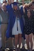 I wore this dress for my graduation and loved it!  It does open up a bit low to where your bra may be visible, so just keep that in mind when wearing.  Otherwise it is a beautiful breezy summer dress that looks gorgeous for any occasion!  It can definitely be dressed up or down. - Shea N.