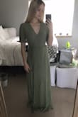 I ordered this dress for my engagement shoot. I read all the reviews for this dress, which said it came wrinkled, was too long, and the tie was hard to figure out. It did come wrinkly, but nothing that a steamer can't fix! The dress is too long; I'm 5'2" and wearing 2" heels in the pictures. This dress is made for a 5'7" person, so if you're short like me, you definitely need to make plans to get it hemmed (or wear super tall heels). The tie was not difficult to figure out since I've worn wrap-style dresses before. The fabric is very soft and very flowy, and it is not see-through at all. My bust is a 32D so if your bust is any smaller and you're under 5'4", I suggest ordering an XS otherwise you'll be swimming in it. If you're short and a 32DD, I suggest ordering a M since it will show lots of cleavage (still plan on getting it hemmed). Overall, I'm ECSTATIC to take pictures with my fiancé in this!! Thank you Lulus! - Morgan S.
