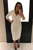 I wore this dress to a very important event and I couldn't have picked a better look. I had to wear spanx bc it's white so you can see "imperfections" but other than that the material is so flattering. The material was a lot thicker than I expected it to be but that's a good thing. It didn't wrinkle even when spending most of the evening seated. I got glammed up and did a dressy look but you could easily go the other way and wear this as a casual or work dress. - Jenifer F.