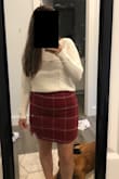 It's soft and surprisingly stretchy! I paired it with a sweater I also got from Lulus. - Rachel M.