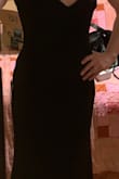 I got this dress for an alternative photo session. I love it because it shows my tattoos (part of the reason I got it). It's a little long, but I'm 5'3, so almost everything is long. I love the material, it's heavy enough that it hangs well, but still comfortable to move around in. - Jennifer U.
