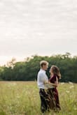 This dress was great for engagement photos. I love the way the color showed up in pictures! You definitely have to pay close attention to the slit and the button that holds the top together. After I washed the dress (following the hand wash, line dry instructions) the fabric was messed up and I can no longer wear the dress. - Megan L.