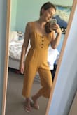 This is such a fun jumpsuit. I'm tall with a shorter torso and long limbs, and the small fit me perfectly. So comfy, no riding up. The material is so light, it's lovely when it's hot outside (although you need to wear a matching colour underneath it), and I found it pretty comfy braless. It's happy and cute. Plus pockets! Love it. - Yosiane W.