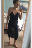 Being tall with a short torso and long legs, jumpsuits are hard. But the straps mean this one works! I saw in a different review that someone adjusted the straps to not be halter-style, and I did the same, and I way prefer it now that the straps are just attached to the back - thanks for the tip haha (see photos). It's not a stretchy material, so it's a bit inflexible when you're sitting down. But not so much that I won't wear it out and about running errands etc all summer. It's great for the price! Might get a burgundy one too. :) - Yosiane W.