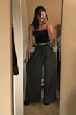 It does say it's gonna be wide leg but I did not expect it to be this huge. My 4 inches heels are completely covered and the pants is not even an inch from the ground. If the legs were a little less wide and a lot shorter, it would have been so cute - Vivian L.