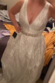 The dress is really nice, so happy with my order! It's shine on sun like diamonds and has nice roses all over the dress which is hard to see on picture! Love it and all my friend and family love my dress as well. Dress a little long so I will need to make it short but definitely live it - Olena M.