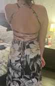 I bought the dress on sale! Which was great!! But I was completely surprised by how much I loved it!! I tied it different then the model does just because I felt like it made my shoulders and back look fat! I was surprised again as to how it was so easy to adjust and still looked good!! I don't know my waist or hips but I know I'm always on the borderline of medium and large! If you're wondering if this dress is worth it I would tell you it is!! - Victoria S.