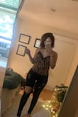 I love this top because it's not super cropped and kinda retro looking with the lace. Its a bit difficult to take off since the buttons are not really functional, but its super soft, almost like silk! Material is not stretchy - Saarah K.