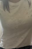 This tee fits true to size. It's comfortable and not tight fitting. - Martha M.