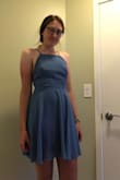 I really loved this dress! It was such a pretty color that is cute for all seasons, and fit super nicely. It was a little short but being tall I've learned to expect that so I'd definitely not count that against it. It's perfect for a formal/homecoming situation. My only little critique is that it isn't the most breathable thing and can get a little hot but since it's short it's not a super big deal. - Ella J.