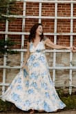 I wore this dress for my engagement photos! They turned out fantastic. The one thing I would say is be prepared for no bra (low back and front, with thin straps) or find a sticky one- I wore a sticky bra and it did the job! - Katie R.