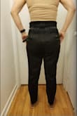 The inner seam of the pants is incredibly itchy. I was uncomfortable as soon as I put them on. I don't know if wearing tights underneath the pants would stop the seam from scratching my thighs but I might give it a try. If not, I don't think I will be able to wear them. There are loose black strings coming from the seams as well (top of the pocket, the pleats in the front, the end of the tie). The size guide told me to order M, and they were quite big. I also ordered the green pants in an S and they fit more to my liking. Maybe it's just my preference. If you're between sizes I would recommend going for the smaller option. - Aran O.