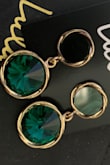 The top "jewel" is a plastic disk that's just kinda stuck on. It's too cheap looking and I probably won't wear them. - Victoria M.