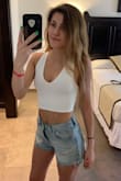 This top perfectly hugs the body & I wear it every chance I get! Because I got it in white I recommend wearing something underneath because it can be a little see through. - Nicolette L.