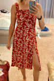 I love this dress! I'm usually between a small and medium and went with a small on this one. I didn't realize it had a fitted waist so it's a LITTLE tight but still wearable. I think a medium would have been too big. The only reason I took a star off is I wish the material was just a little more comfortable. It's not uncomfortable per se but it's just a little rougher than I was expecting. - Laura M.