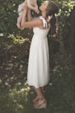 This was a beautiful dress- I wore it to family pictures. It fit true to size and was flowy and beautiful at the bottom! Comfy but elegant at the same time!  Highly recommend this dress! LOVE the bow sleeves! You won't be disappointed! - Bethany H.