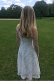 I wore this for my high school graduation, and it fit great! I had no problems with the fit or the material. If you wear dark colored spandex, it is a bit see-through but that's easy to avoid. I would definitely recommend this to a friend! :) - Kate K.