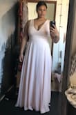 This dress is gorgeous. I'm a medium/large with a large busy and broad shoulders and ordered an XL because I wanted to make sure it fit. I like that the fabric is heavier, appears to be of a higher quality, hangs well, and is a beautiful color. You can wear a regular bra with this dress, but the shoulders and back are made of an opaque fabric (just something to keep in mind).
The one thing that was unexpected about this dress is the deep V in front that shows literally all of my cleavage. I bought this dress in the hopes that it would be a more modest addition to my closet, but if you are a woman with a full bust, keep in mind that it has a deep V in front and will show off the girls. I chose to wear a little sweater over it or wear a camisole until I can find a lace front that I can sew into the dress. - Abigail O.