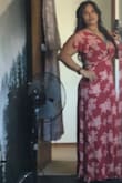 I love this dress! It's a casual fabric that hangs beautifully and can be dressed up or down depending on shoes and accessories. I'm planning on wearing it with a jean jacket for the next rodeo or country concert I go to. 

Although this dress is really cute, I did find that the bust shows a lot of cleavage, so if I'm going for a more modest look I have to wear a slip or camisole underneath. Also, I do not think the front panels of the dress wrap around enough, so when the wind blows or when I sit down, they come all the way open up to my bust. Not great. I chose to wear a full-length slip that I bought on amazon underneath. That way, if the wind blows the panels apart my legs aren't exposed. Looks great. - Abigail O.