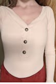 I like it. Will match with anything and it is comfortable and breathable. I din't know what I think about the size, I think I should have gone for medium, even though I am definitely size Small. I think maybe it shrank a bit in the drier, so watch out for that. Overall it's cute and looks good on girls with petite shoulders as it draws attention to them. P.S. you will need to wear bra with this one, I kinda wish it had built in bra. - Polina L.