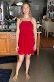 First off this dress was long enough for me, I am mostly leg with a shorter torso though so this dress may not work for my tall girls with long torso's. I'd suggest sizing down if you have smaller boobs Or want this to be fitted. I wear a 34E and this was loose on my chest and the slack bunches up weirdly on my waist which was ultimately why I chose to return it. This did show a bit of side boob for me which I didn't mind. - Savannah R.