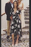 After reading the reviews, I decided to order a size down and I loved how it fit. If it weren't my graduation, I wouldn't have pinned the front, but I was just trying to be extra conservative. I got so many compliments. Very light and flowy! - Carolina L.