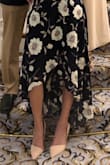 Beautiful shoes but they run 1 size large. I normally wear a size 9 and purchased a size 8.5. Size 8 fit better. - Carolina L.
