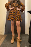 It gives a very relaxed feel! Kind of a boho-chic! And I love it!!! I normally order M but S fits perfectly!!! It looks good with either flats or heels. I'm in love!!! And the compliments on this dress is overwhelming. The top part of the dress is pretty sheer but not something to be worried about, you can always put on a black sleeveless top or a cute bralette.  It's very flowy and it's perfect for any occasion. - Jasmin L.