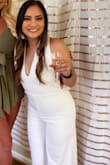 I ordered this jumpsuit for my wedding shower and it was perfect! I had to get it altered for the length and the back straps, but other than that, I loved it!! The only thing I disliked was you have to uncross the back of it to use the bathroom and your makeup might get on it when doing so. - Dashiel C.