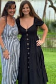 I'm a size 4 on top and 6 on the bottom, and this dress fit both well. I got a ton of compliments when I wore it! The neckline is pretty low cut, but I didn't mind it, I was just more mindful when reaching for something or bending over. - Mrs D.