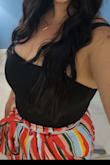I have this bodysuit in a few different colors and they are staples in my closet! I love that the material is thick and not see through, it even gives a little compression which makes for a flattering shape. Plus you don't need to wear a bra which is a bonus. I will say it is a little short in the torso but overall my favorite bodysuit. - Melissa M.