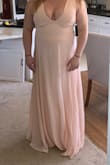 Bought for my bridesmaid and while it was a smidge snug she says it is very comfortable and it makes her boobs look amazing! It does an amazing job cinching her waist and making it look tiny! The fabric is gorgeous and luxurious and the color is PERFECT! - Sarah N.