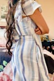 The dress fits perfect! I love the length and is perfect for summer - Jessica M.