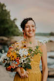 I bought this dress to use for a styled elopement shoot (model's measurements above) and it was perfect! The length was maybe a couple of inches too long, but she was wearing hiking boots so that actually worked out fine. The dress was lightweight and comfortable for her to move freely in. The color photographs very well. It's a little bit more clear than what I would maybe consider "mustard" but it is a rich, darker yellow for sure. - Lily H.
