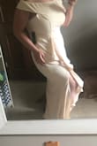 Ordered this to wear at my rehearsal dinner. Absolutely love it. Very nice, thicker material. It is a very light pink hue. Has some stretch to it. It's definitely super long on me so I will have it tailored, but a lot of maxi dresses are long on me. Highly recommend. Very simple and classy. - Courtney C.