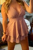 I got this romper for a wedding and I can't say enough good things about it. True to size, looks just like to picture. Even has a clasp above the zipper which is a bonus for keeping it from unzipping. Straps are adjustable to your liking. I'm able to wear sticky petals instead of a bra. I will say that the romper is rather short especially on the sides of the thighs, but it's longer in the back than it is in the front. It really looks more like a dress than a romper because of the layers. Paired with a pair of Lulus wooden block heels. I would recommend this romper & buy again in more colors! - Sara N.