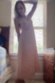 I absolutely love this dress and received so many compliments on it. That being said, beware of the straps, I'm 5'4" and ordered an XS. I had to shorten the straps by about 4" to make sure I was covered fully. Other than that it's a beautiful dress. - Jolee B.
